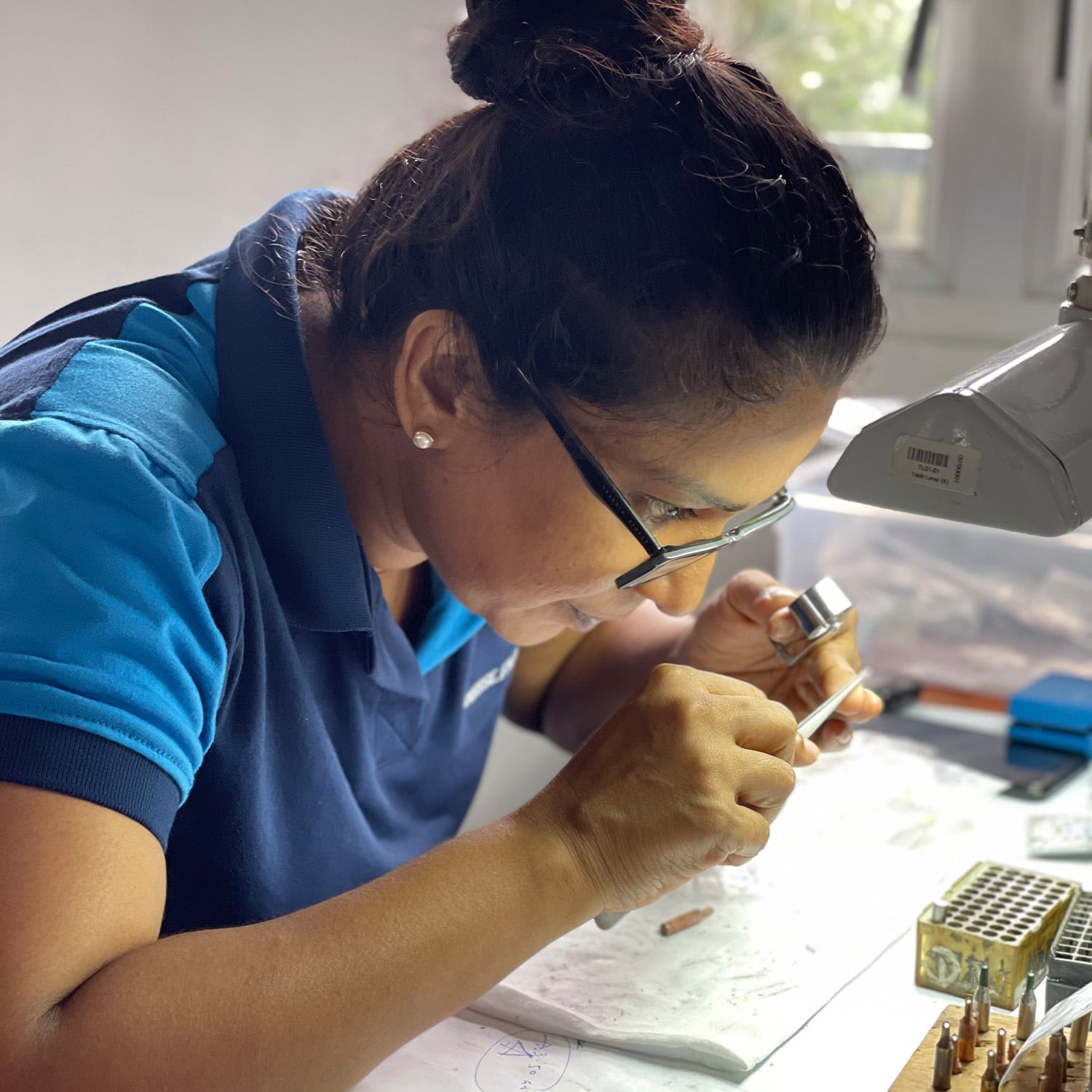 Founder of Sunrise Facets Nilanthi Thisera working in the factory