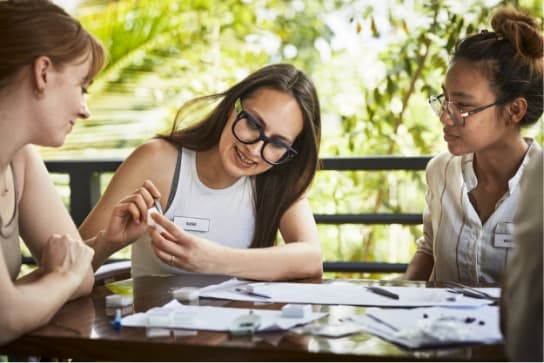 Susie and Amy sat on the balcony at the Lapidary, studying the freshly cut sapphires in the sunlight.