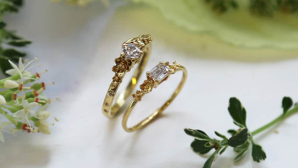 Two Diamond Solitaire 18ct yellow gold engagement rings.