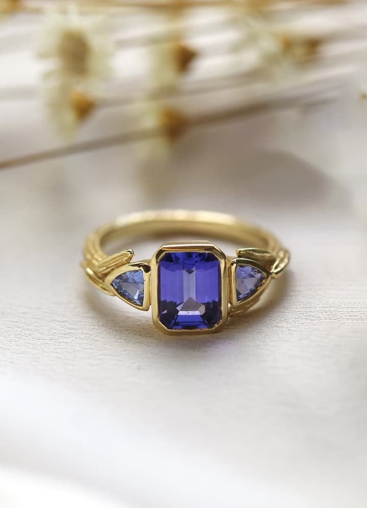 One of a Kind, Fennel Seed Deco Trilogy Tanzanite and Sapphire 18ct yellow gold ring.