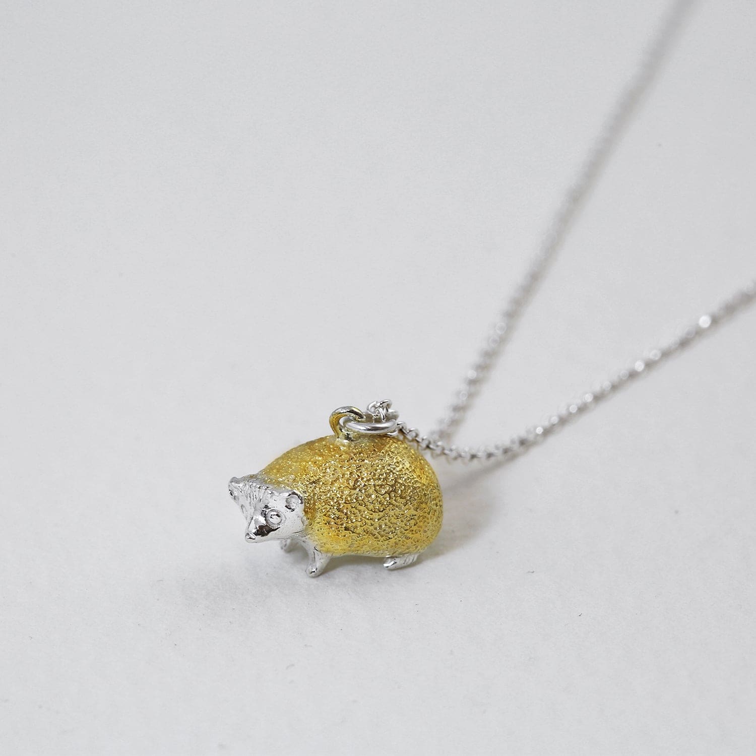 alex monroe x friends of the earth hedgehog necklace mixed metal