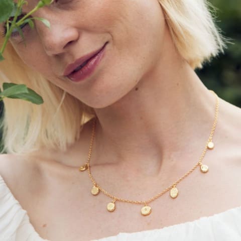 Model wears Paleontology Nugget Necklace