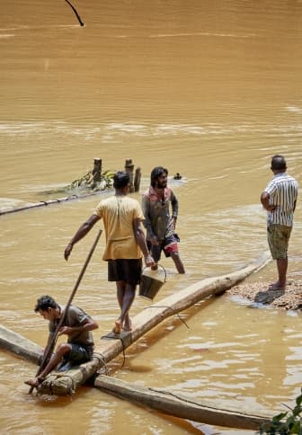 Men working on a river in Sri Lanka.