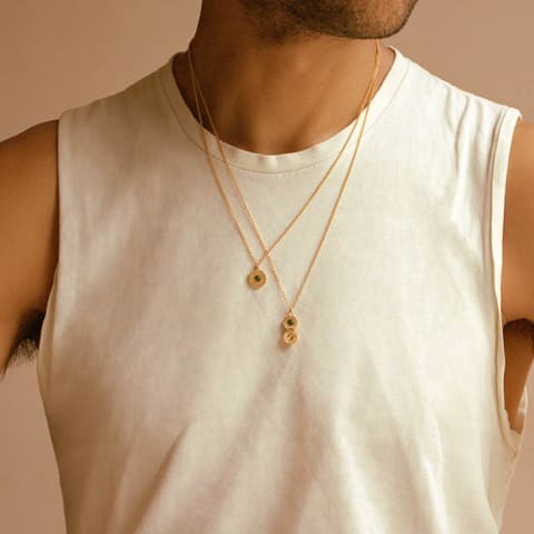 Raven Smith wears Iris Reversible Disc Green Tourmaline Necklace