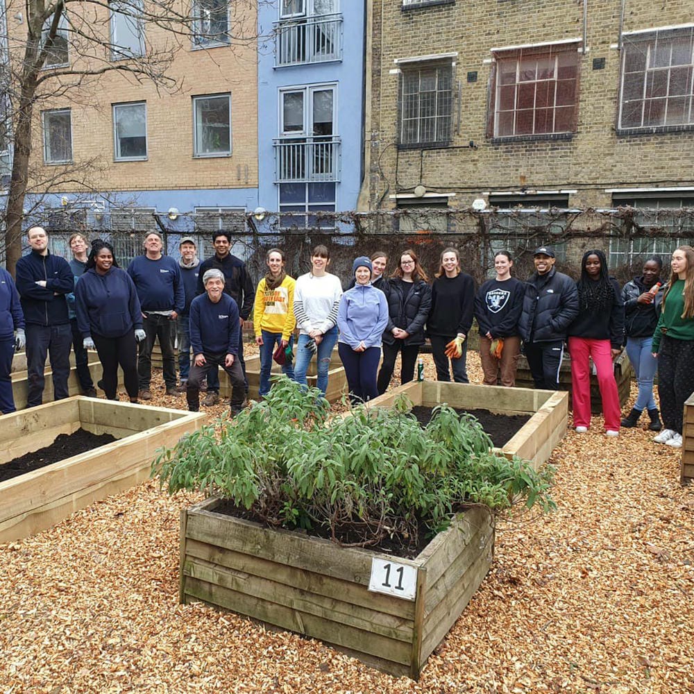 Members of the Alex Monroe team volunteering on a local project.